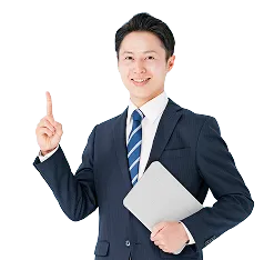 人差し指を立てる男性の写真